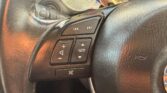 steering wheel closeup view of 2014 Mazda CX-5