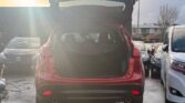 open trunk view of used red 2014 Mazda CX-5