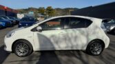 used white 2014 Toyota Aqua full side view