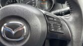 steering wheel closeup view of 2014 Mazda CX-5 20S