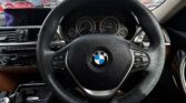 steering wheel view of 2014 BMW 3