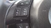 steering wheel closeup view of used 2014 Mazda Axela