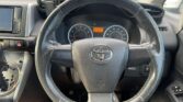 steering wheel view of 2011 Toyota Wish