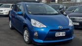 front side view of blue 2012 Toyota Aqua