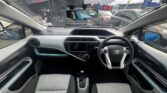 front seats view of used blue 2012 Toyota Aqua