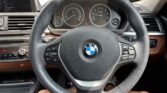 steering wheel view of used 2014 BMW 3