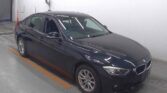 used 2014 BMW 320i car front side view