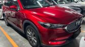 front side view of red 2020 Mazda CX-8