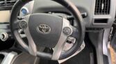 steering wheel view of 2012 Toyota Prius Alpha