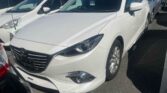 side view of 2014 Mazda Axela