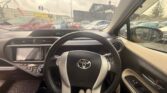 steering wheel view of 2014 Toyota Aqua