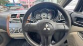 steering wheel view of 2006 Mitsubishi Colt