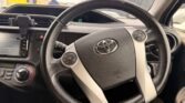 steering wheel view of 2012 Toyota Aqua