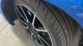 closeup view of wheel of 2015 Toyota Aqua