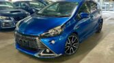 front side view of used blue 2015 Toyota Aqua