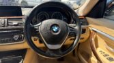 steering wheel view of 2015 BMW 320i