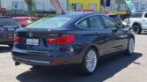 used 2015 BMW 320i back side view