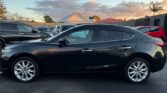 full side view of 2015 Mazda Axela
