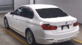 back side view of 2014 BMW 320i I LUXURY