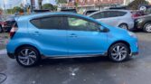 full side view of 2015 Toyota Aqua