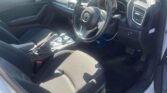 front door open view of 2014 Mazda Axela