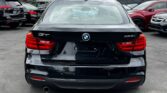 back view of 2014 BMW 320i