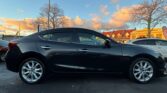 full side view of 2015 Mazda Axela