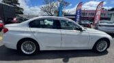 full side view of 2014 BMW 320i