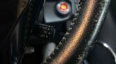 steering wheel closeup view of 2015 Toyota Aqua