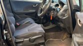 front door open view of 2010 Honda Fit