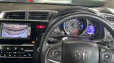 steering wheel view of 2014 Honda Fit 15X L