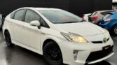 front side view of white 2014 Toyota Prius