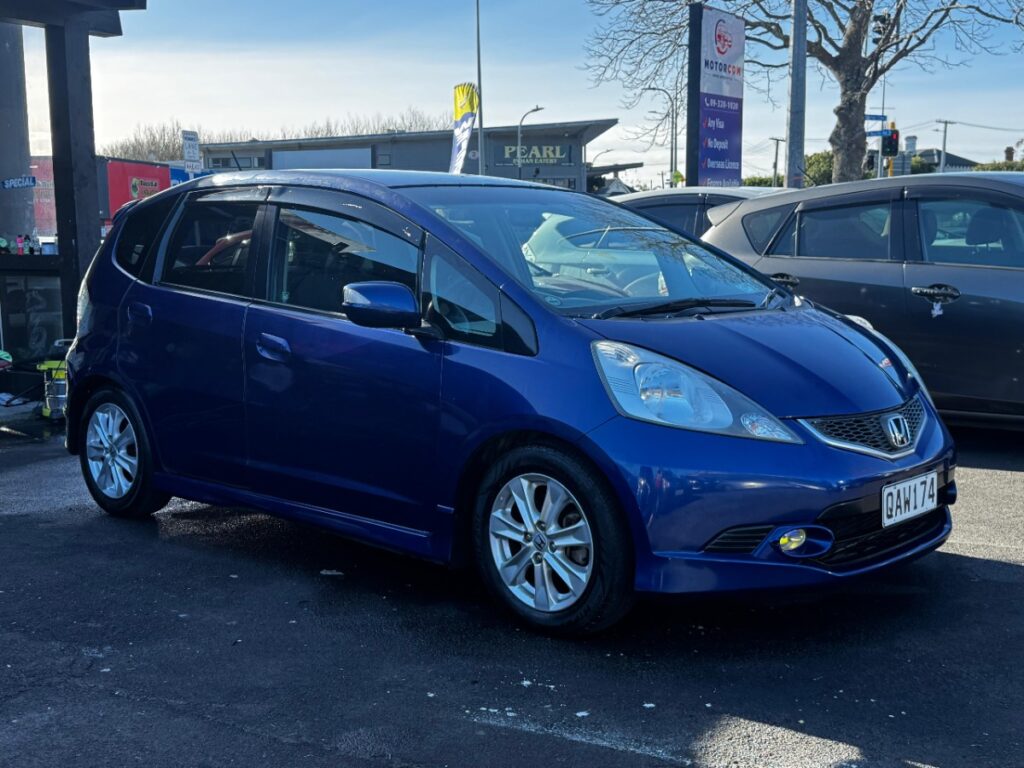 front side view of used blue 2010 Honda Fit