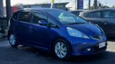 front side view of used blue 2010 Honda Fit