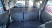 back seats view of blue used 2010 Honda Fit