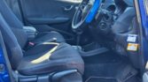 front door open view of 2010 Honda Fit