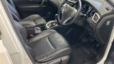 front door open view of 2016 Nissan X-Trail
