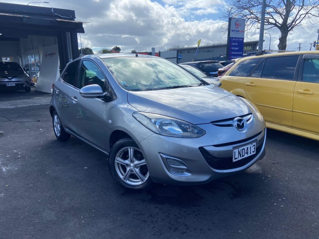 side view of used 2013 Mazda Demio