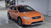 front side view of used orange 2014 Subaru XV