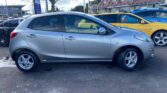 used car 2013 Mazda Demio full side view