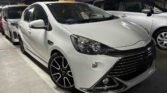 pearl white 2014 Toyota Aqua G side view
