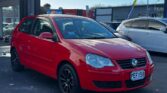 front side view of red used 2008 Volkswagen Polo