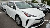 front side view of white 2020 Toyota Prius E
