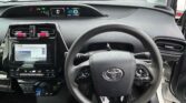 steering wheel view of 2020 Toyota Prius E