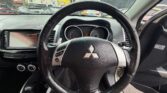 steering wheel view of 2006 Mitsubishi Outlander