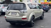 used 2006 Mitsubishi Outlander back side view