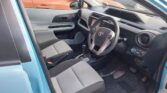 front door open view of 2012 Toyota Aqua