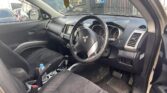 front door open view of 2006 Mitsubishi Outlander