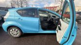 front door open view of 2012 Toyota Aqua