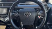 steering wheel view of 2014 Toyota Aqua